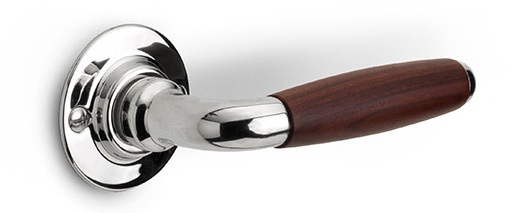 1932GRR50 - solid sprung door handle on round rose brass unlacquered/ebony wood