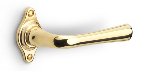 1948GRL - sprung lever handle on rose brass unlacquered