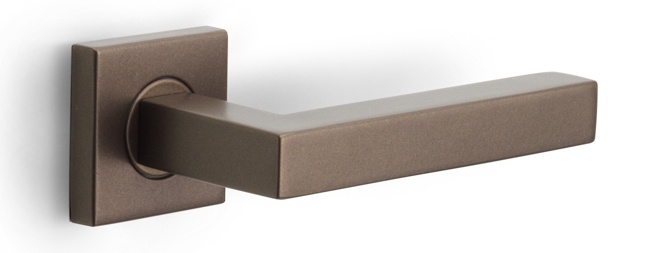 BSQ1 - sprung lever handle on rose bronze