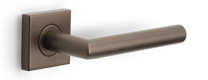LB2-19BSQ - sprung lever handle on rose bronze