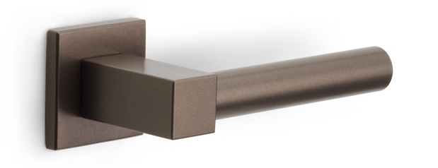 EK101-G - sprung lever handle on rose bronze